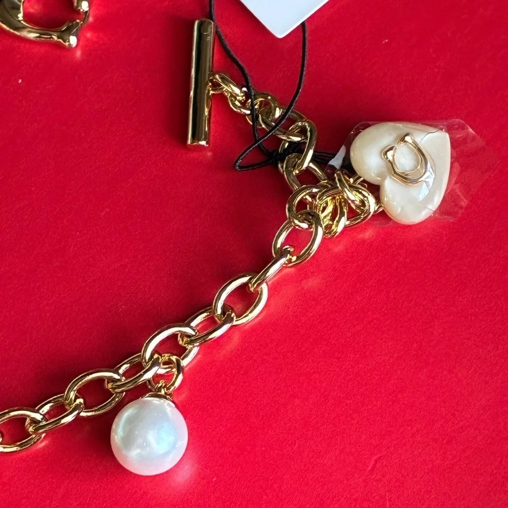 COACH Bracelet,Coach Gold and Gray Charm Bracelet